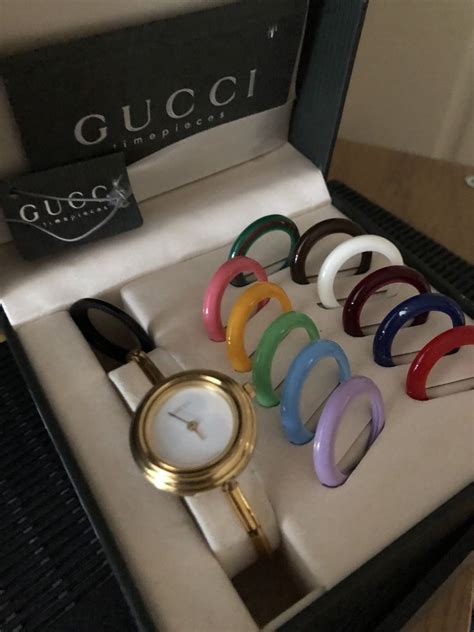 gucci bangle watch with interchangeable bezels|gucci watch with interchangeable bezels.